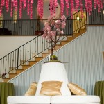 white furniture with branch centerpiece